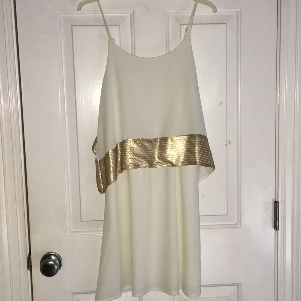 White and gold cocktail dress.